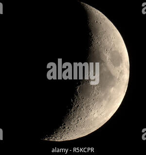 Waxing crescent moon seen with telescope Stock Photo