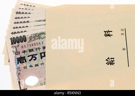 Japanese money in salary envelope on white background Stock Photo