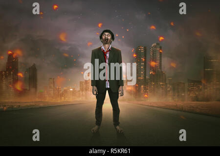 Creepy asian zombie man in suit standing on the street Stock Photo