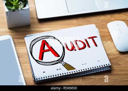 Audit And Fraud Investigation In Notepad Stock Photo