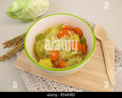 stew with pointed cabbage and millet Stock Photo