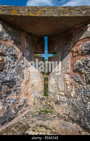 A detail from one of the Loopholes on the battlements at Bishop's Palace in the city of Wells, Somerset. Stock Photo