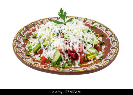 Traditional bulgarian Shopska salad isolated on white bakcground. Made by classic recepie. Stock Photo
