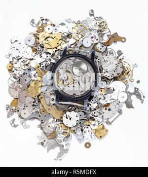 top view of mechanic watch on heap of spare parts Stock Photo
