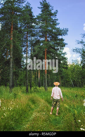 Man in Summer Forest Stock Photo