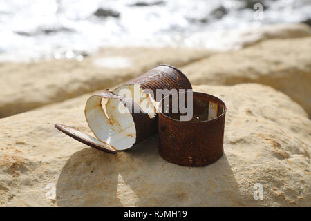 Old rusty cans Stock Photo