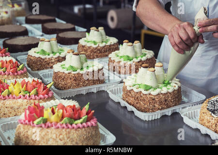 Manual cakes production Stock Photo