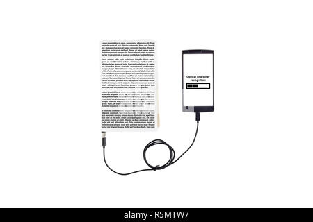 Book connected to a smartphone through an USB cable. Optical character recognition loading bar. Stock Photo