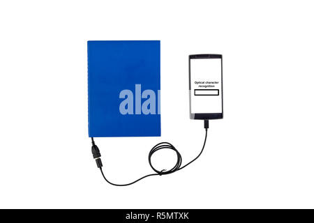 Book connected to a smartphone through an USB cable. Optical character recognition loading bar. Stock Photo