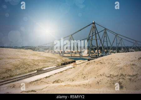 view from the newly opened extension canal into the old suez canal and the el ferdan bridge Stock Photo