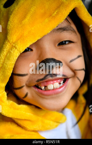Funny make up on asian teen Stock Photo