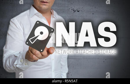 nas touchscreen is operated by man Stock Photo