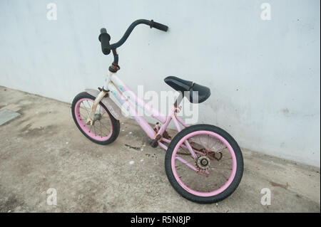 A broken rear wheel kid bicycle Stock Photo