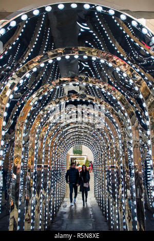 The new ‘infinity chamber’ light installation in Conduit Court, off Floral Street. - Christmas in Covent Garden Stock Photo