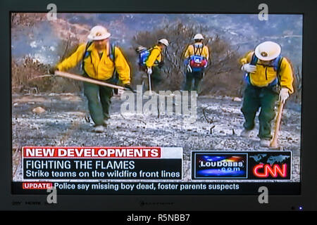 Miami Beach Florida,flat panel TV,television,set,screen shot,media,news,newscast,broadcast,cable,CNN,wildfires,firefighters,disaster,updates,FL0909120 Stock Photo