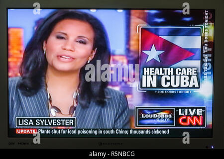 Miami Beach Florida,flat panel TV television set screen shot,newscast cable CNN journalist reporter media,interviews,news anchor woman female Lisa Syl Stock Photo