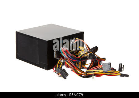 Black computer power supply unit psu with messy cables on isolated white background Stock Photo