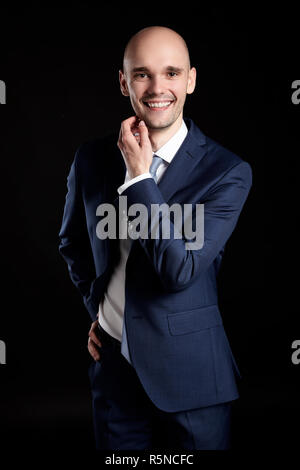 Handsome Man Stroking his Chin Stock Photo