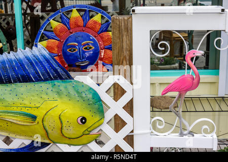 Florida Florida Keys,Islamorada,US highway Route 1,Overseas Highway,garden decor,interior design,yard art artwork,dolphin fish,pink flamingo,sun,metal Stock Photo
