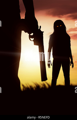 Silhouette of man with the red eye zombie Stock Photo