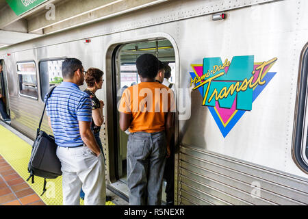 Miami Florida,Civic Center Metrorail Station,mass transit,elevated rail system,train,Black African Africans,Hispanic woman female women,man men male,p Stock Photo