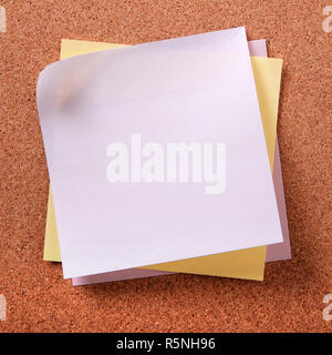 Various colors several sticky post notes on cork background Stock Photo