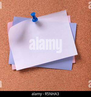 Several various colors sticky post notes cork background Stock Photo
