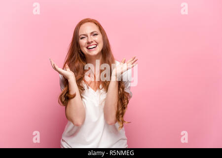 Portrait of young woman with happy facial expression Stock Photo