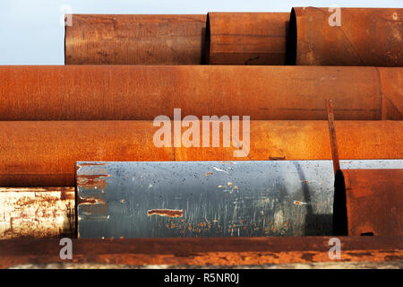 Stack of industrial metal pipes Stock Photo