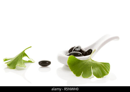 Ginkgo leaves with gel capsules. Stock Photo