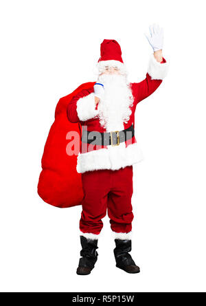 Santa Claus carrying big bag of gifts isolated on white background ...