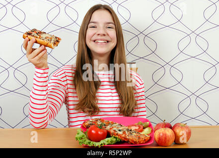 Happy beautiful teenage girl with sandwich Stock Photo
