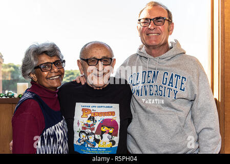 California, USA. 1st Dec 2018. Author, Ivor Davis with Janet and Mark Goldenson at book signing at Pierpont Racquet Club in Ventura, California, USA on December 1, 2018. Credit: Jon Osumi/Alamy Live News