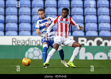 Reading, UK. 1st Dec 2018. Cuco Martina of Stoke City is challenged by Chris Gunter of Reading FC during the EFL Sky Bet Championship match between Reading and Stoke City at the Madejski Stadium, Reading, England on 1 December 2018. Photo by Ken Sparks. Editorial use only, license required for commercial use. No use in betting, games or a single club/league/player publications. Credit: UK Sports Pics Ltd/Alamy Live News Stock Photo