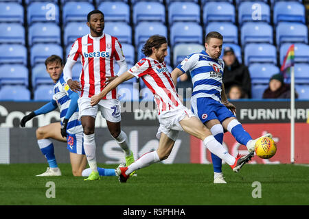 Reading, UK. 1st Dec 2018. Chris Gunter of Reading FC is challenged by Joe Allen of Stoke City during the EFL Sky Bet Championship match between Reading and Stoke City at the Madejski Stadium, Reading, England on 1 December 2018. Photo by Ken Sparks. Editorial use only, license required for commercial use. No use in betting, games or a single club/league/player publications. Credit: UK Sports Pics Ltd/Alamy Live News Stock Photo