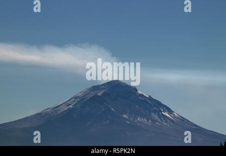 Mexiko Stadt, Mexico. 02nd Dec, 2018. Smoke clouds can be seen above the volcano Popocatepetl in the highlands between Puebla and Mexico City. The volcano erupted early in the morning. Credit: Gerardo Vieyra/dpa/Alamy Live News Stock Photo