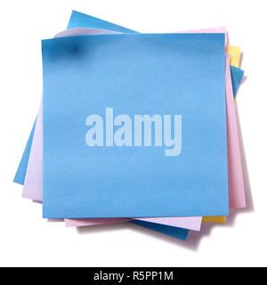 Untidy pile various colors sticky post notes isolated on white Stock Photo