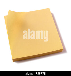 Yellow sticky post notes pad white background Stock Photo