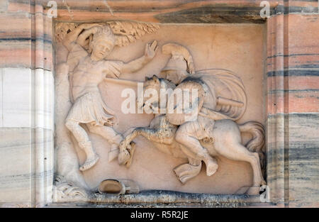 Marble relief on the facade of the Milan Cathedral, Duomo di Santa Maria Nascente, Milan, Lombardy, Italy Stock Photo