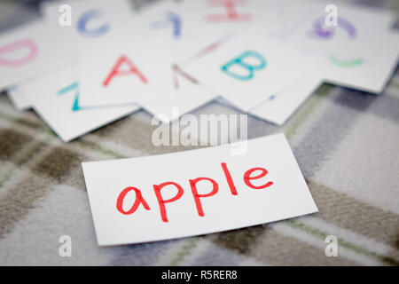 English  Learning the New Word with the Alphabet Cards Stock Photo