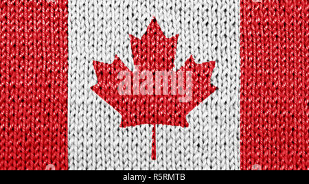Canadian national flag blended on white knitted background Stock Photo