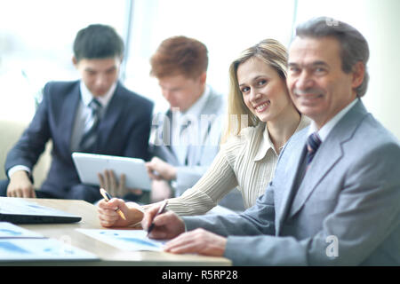businessman and assistant in the workplace in the office Stock Photo