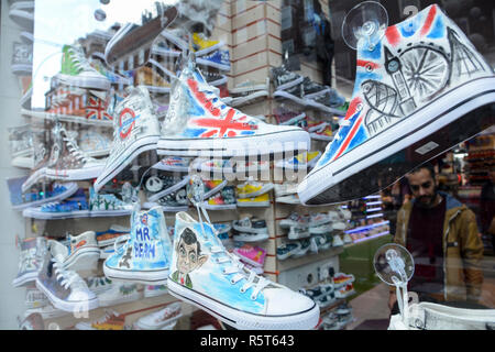 Mr Bean converse shoes in a shoe shop, Oxford Street, London, UK Stock Photo