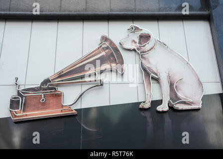 Nipper the Jack Russell terrier outside His Masters Voice (HMV) flagship record store, 363 Oxford Street, London, UK Stock Photo