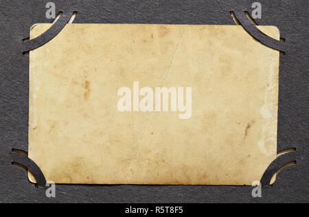 Background with texture of grunge old photo in an album Stock Photo