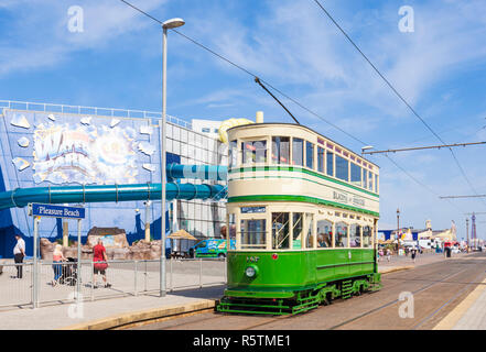 Blackpool tram heritage tram in front of the Sandcastle waterpark aquatic fun park on the Promenade at Blackpool Lancashire England UK GB Europe Stock Photo