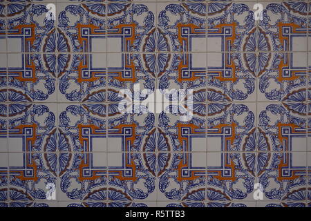 Lisbon / Portugal - May 2017: Portuguese traditional painted tin-glazed ceramic tiles Azulejos decorated with beautiful intricate ornament Stock Photo