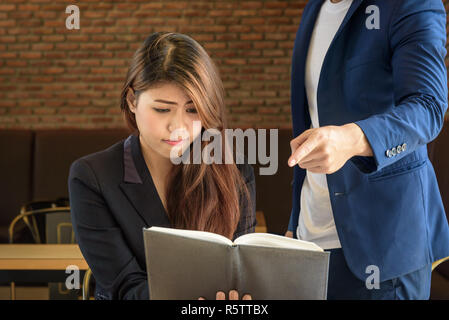 blaming frustrated businesswoman in office, selective focus Stock Photo