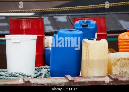 Plastic cans of chemicals Stock Photo