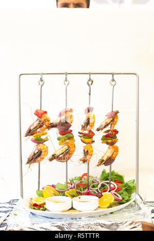 Mediterranean style fresh prawn skewers shish Stock Photo